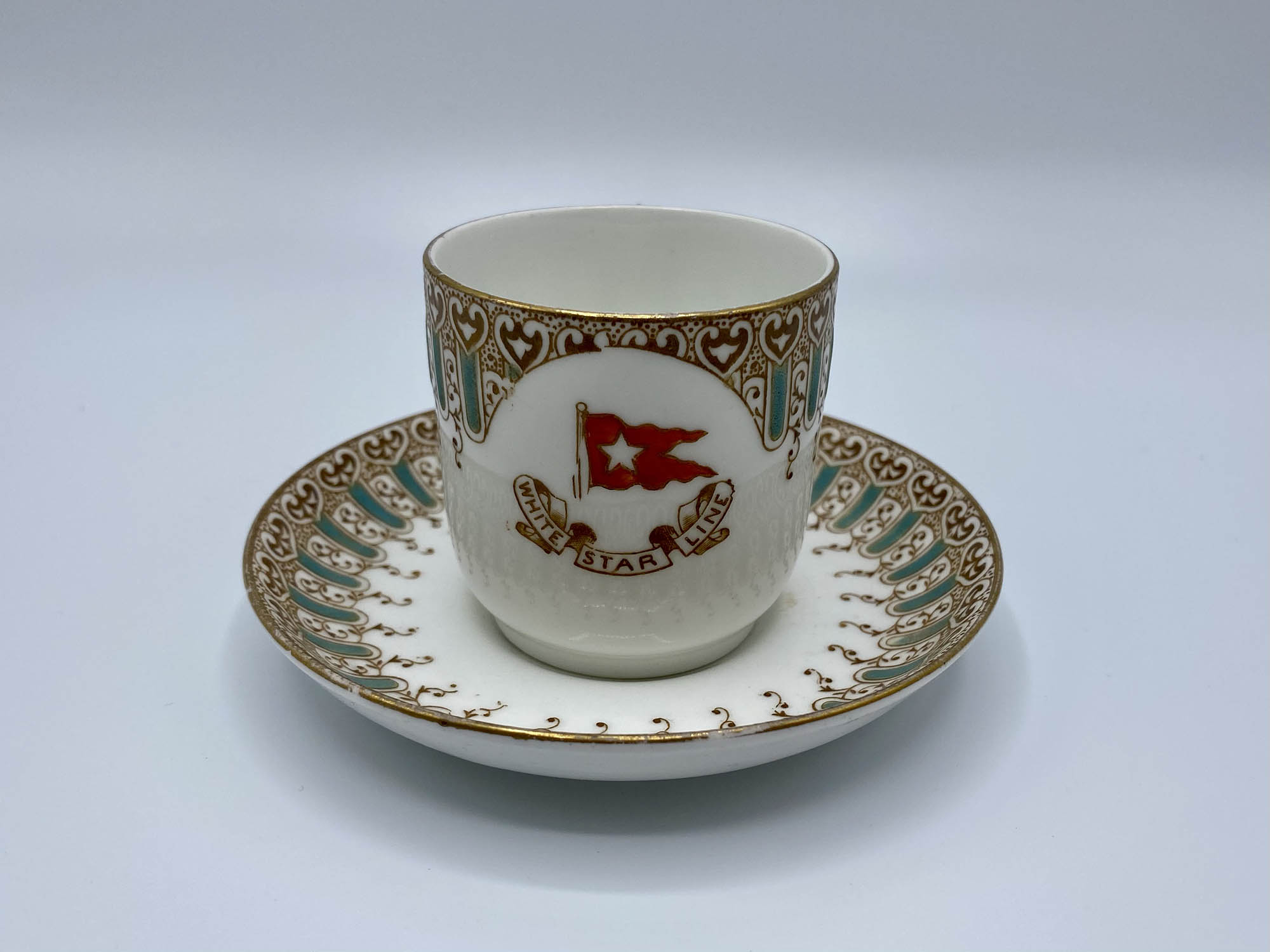 https://www.titanicmuseum.org/wp-content/uploads/2019/01/White-Star-Line-Wisteria-Pattern-Coffee-Cup-Saucer-1.jpg